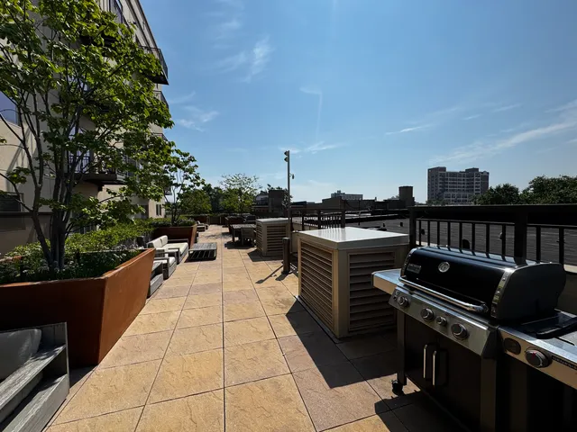a room with gym equipment and a large window