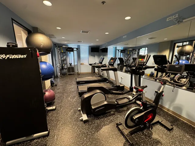 a view of a room with gym equipment