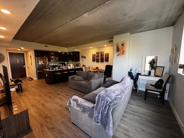 a view of balcony with wooden floor