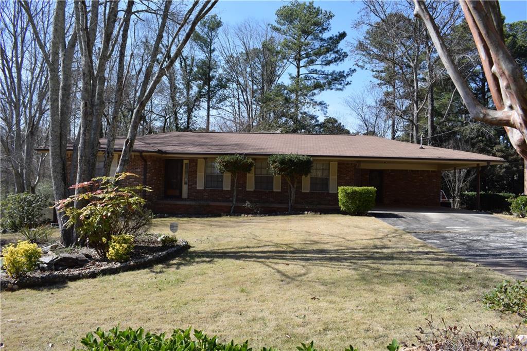 3203 Cheru Court Decatur, GA 30034 - Photo 1 of 1 BEAUTIFUL CURB APPEAL! - 4 SIDE BRICK WITH GREAT LANDSCAPE DESIGN, COMPLETE WITH KOI POND!!