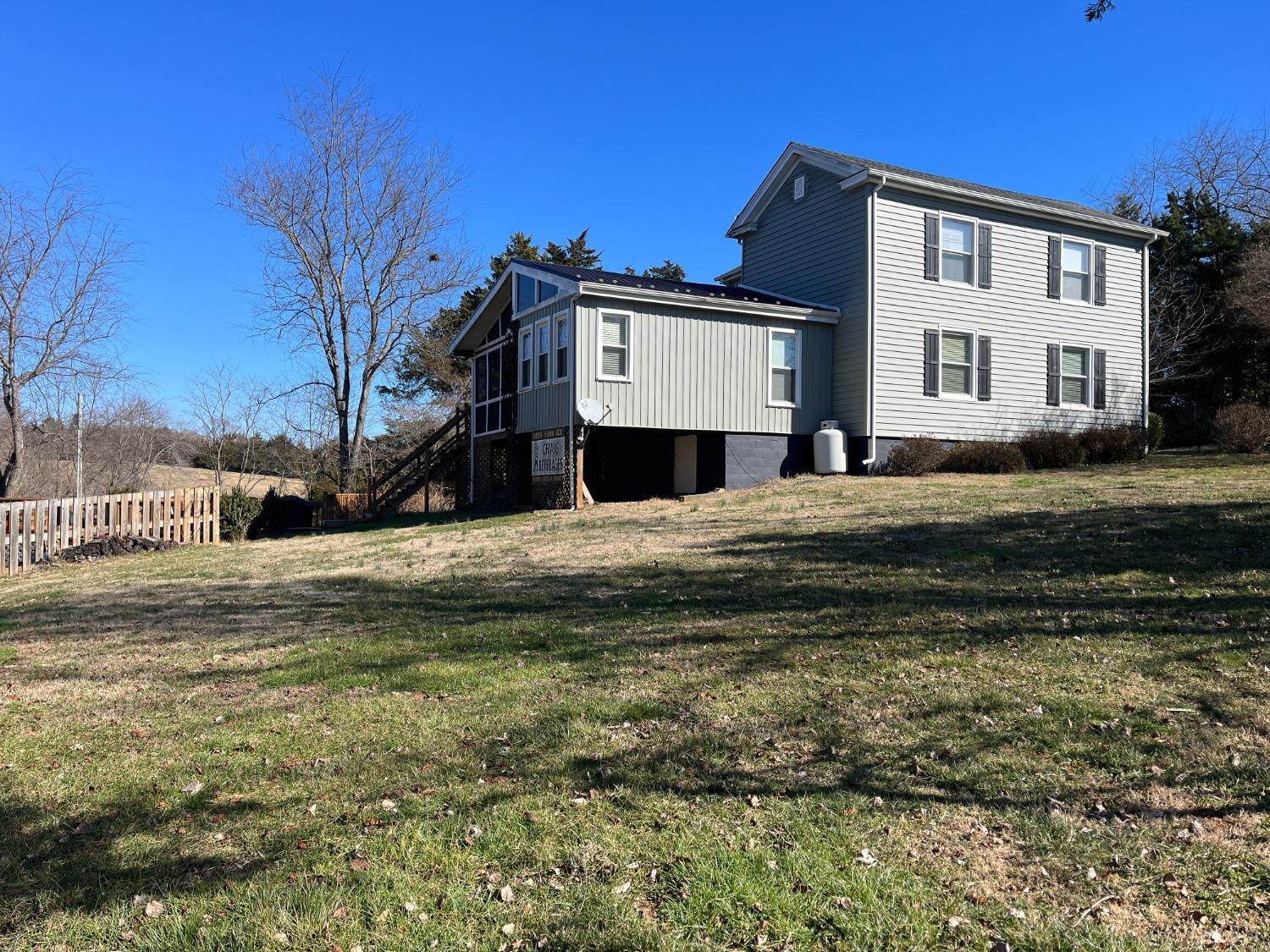 9710 Forest Road Goode, VA 24556 - Photo 42 of 49 a front view of a house with a yard