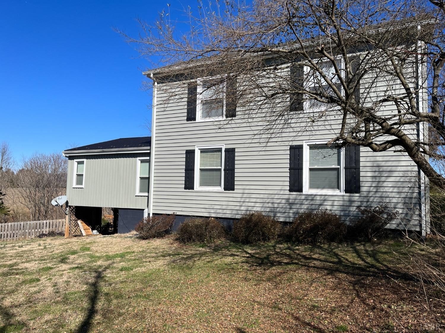 9710 Forest Road Goode, VA 24556 - Photo 44 of 49 a front view of a house with a yard