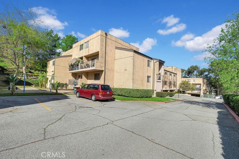 1781 Neil Armstrong Street, Unit 112 Montebello, CA 90640 - Photo 19 of 19 a view of a house with a yard