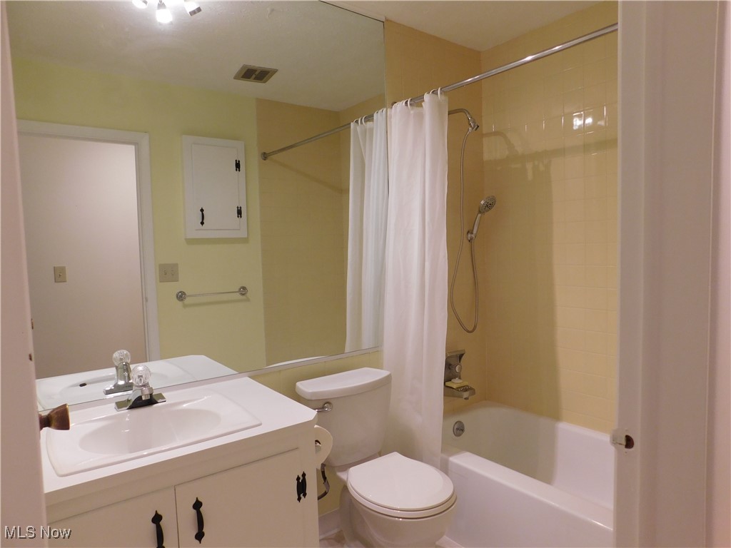 32885 Mills Road North Ridgeville, OH 44039 - Photo 28 of 42 Bathroom featuring shower / bath combo and vanity