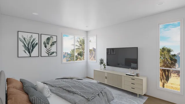 a kitchen with stainless steel appliances white cabinets and wooden floor
