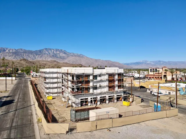 a view of residential houses with a terrace view