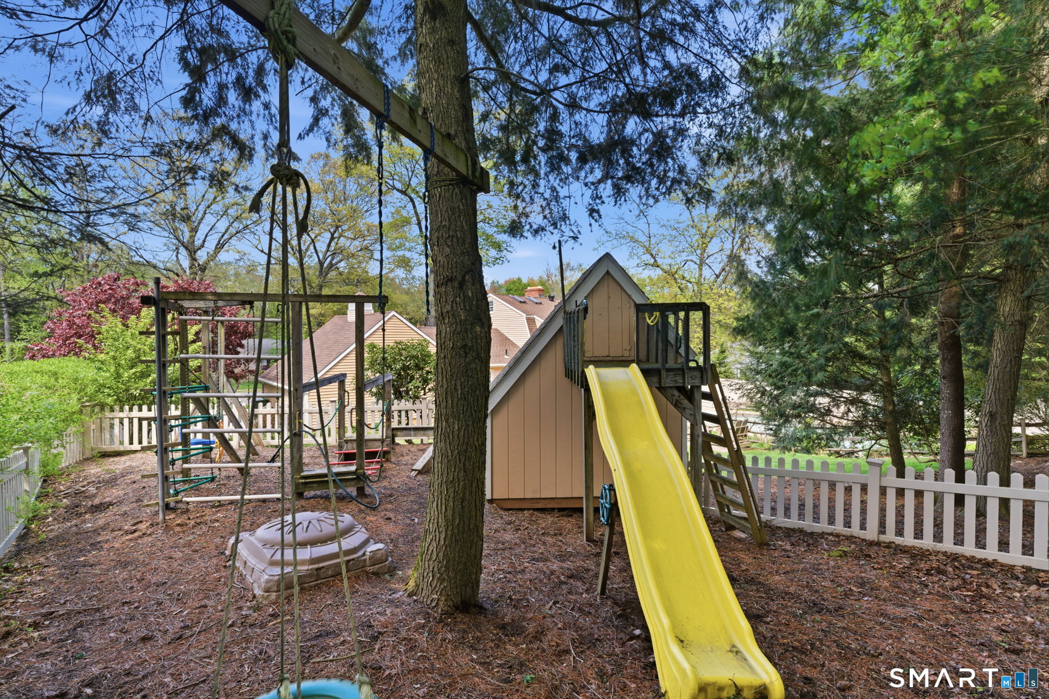 79 Buckboard Lane Bristol, CT 06010 - Photo 10 of 40 a view of a chairs in a backyard