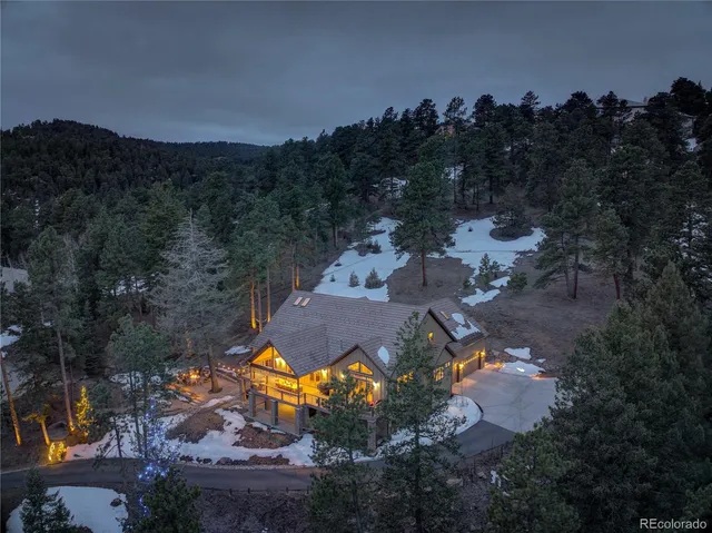 an aerial view of residential house with outdoor space