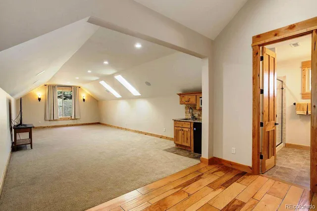 a view of a livingroom with a staircase