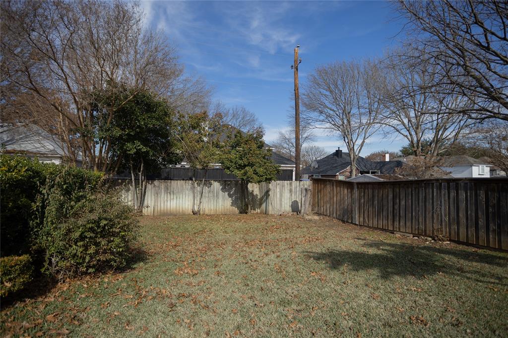 809 Sterling Court Allen, TX 75002 - Photo 12 of 16 a view of backyard with tree
