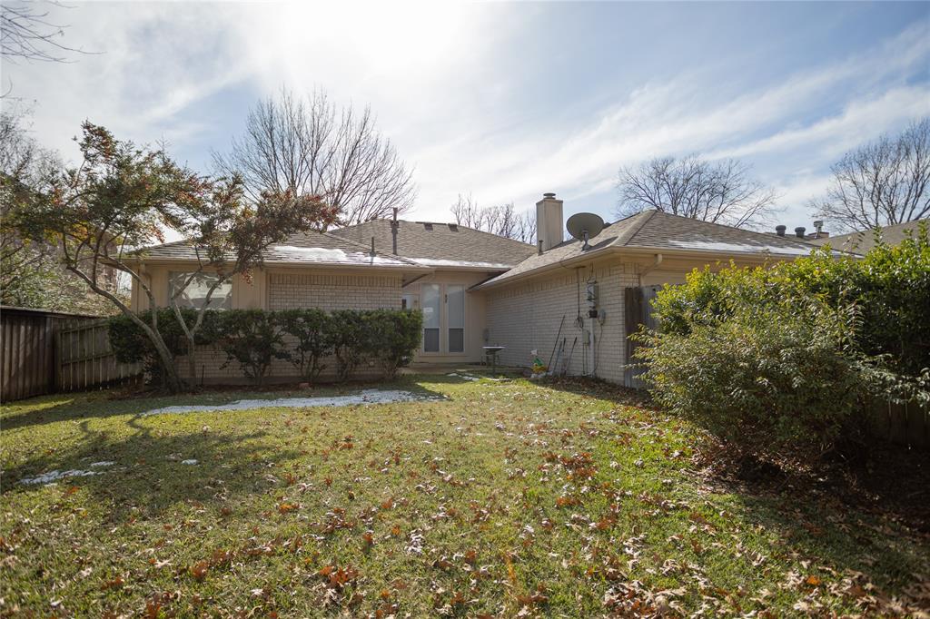 809 Sterling Court Allen, TX 75002 - Photo 13 of 16 a backyard of a house