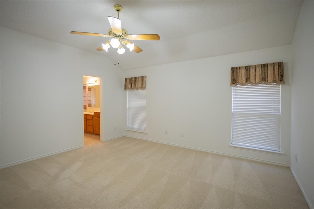 809 Sterling Court Allen, TX 75002 - Photo 5 of 16 a view of an empty room with a window