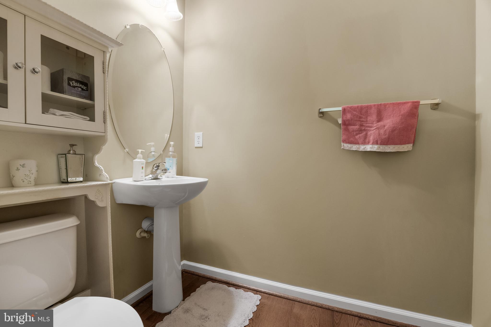 23 Mullen Drive Sicklerville, NJ 08081 - Photo 26 of 73 a bathroom with a sink mirror and toilet