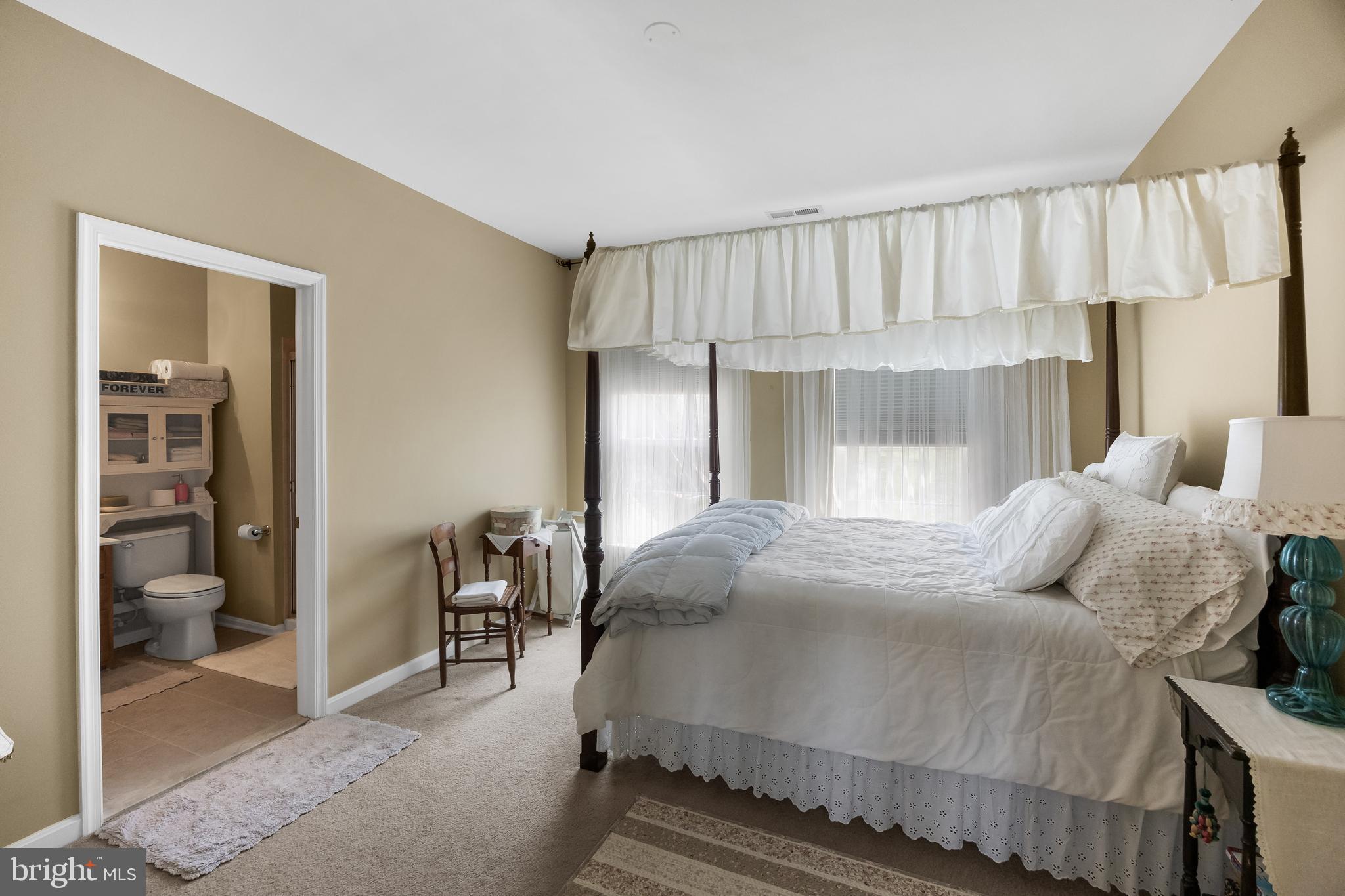 23 Mullen Drive Sicklerville, NJ 08081 - Photo 35 of 73 a bedroom with a bed and a mirror