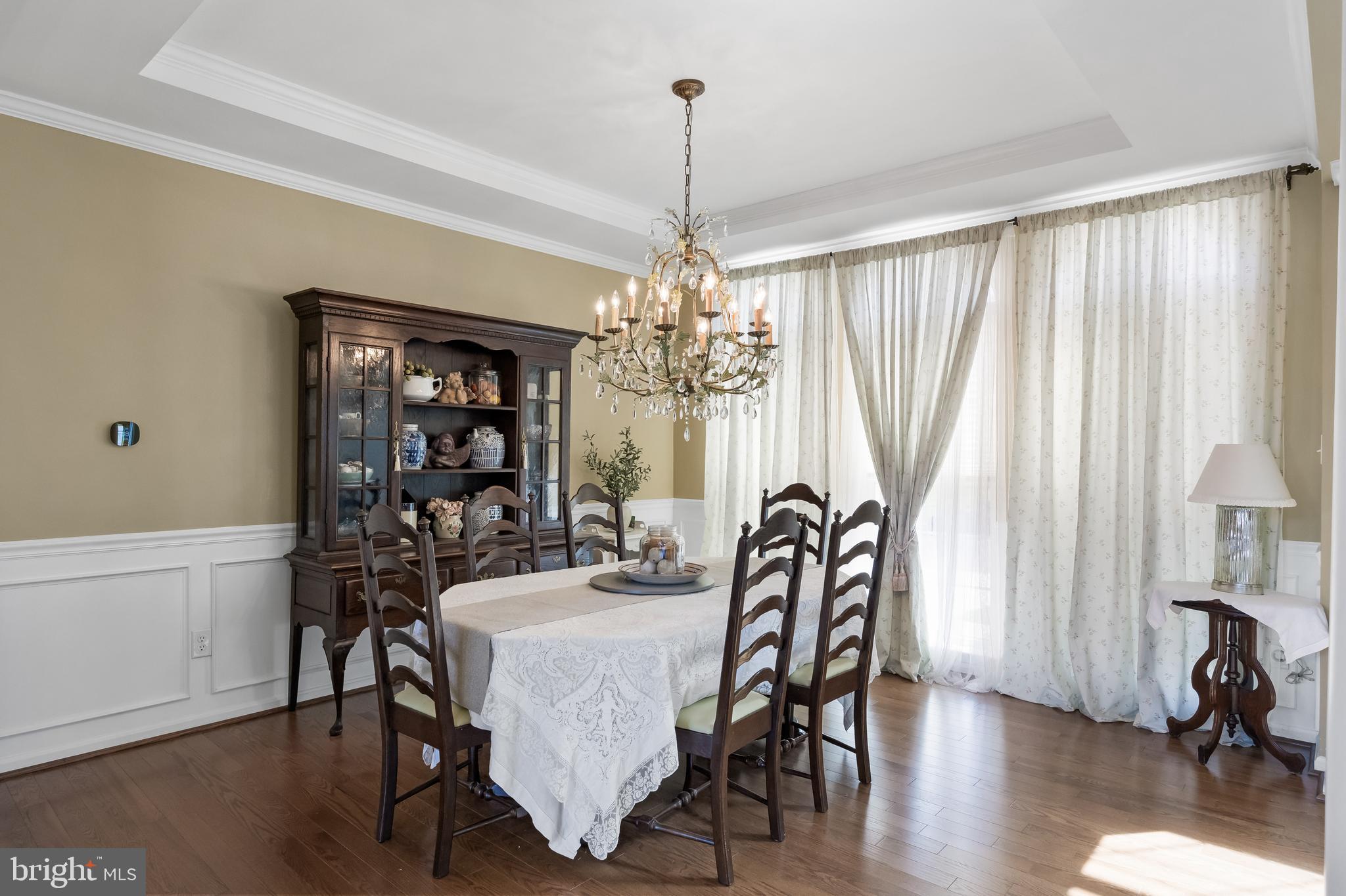23 Mullen Drive Sicklerville, NJ 08081 - Photo 8 of 73 a view of a dining room with furniture window and wooden floor