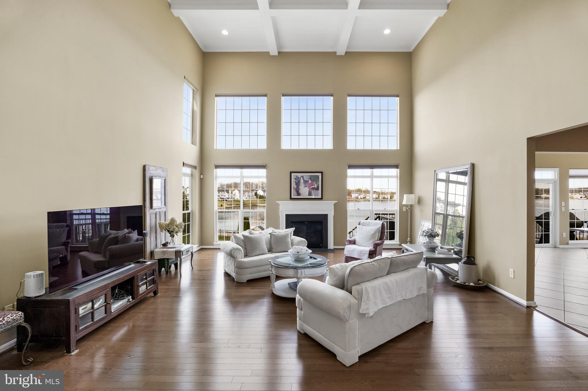 23 Mullen Drive Sicklerville, NJ 08081 - Photo 10 of 73 a living room with furniture flat screen tv and hard wood flooring