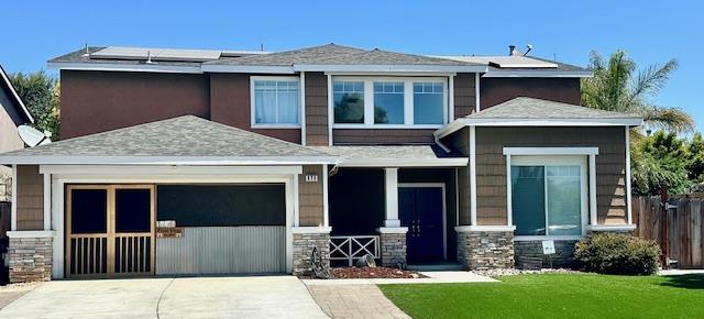 820 Talbot Drive Hollister, CA 95023 - Photo 1 of 27 a front view of a house with a yard