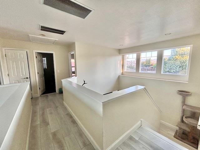 820 Talbot Drive Hollister, CA 95023 - Photo 16 of 27 a view of hallway with window and wooden floor