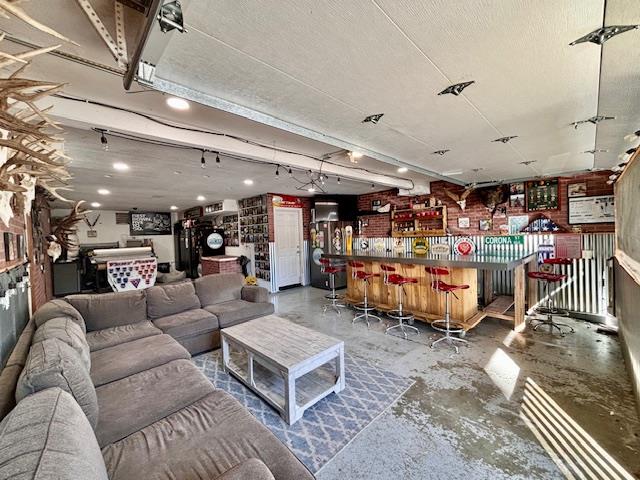 820 Talbot Drive Hollister, CA 95023 - Photo 26 of 27 a living room with lots of furniture and a chandelier