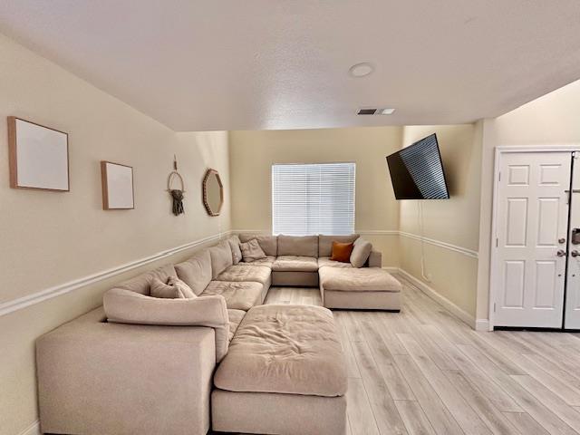 820 Talbot Drive Hollister, CA 95023 - Photo 4 of 27 a living room with furniture and a flat screen tv
