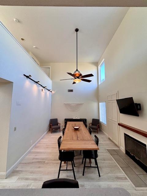 820 Talbot Drive Hollister, CA 95023 - Photo 7 of 27 a living room with furniture a flat screen tv and a ceiling fan