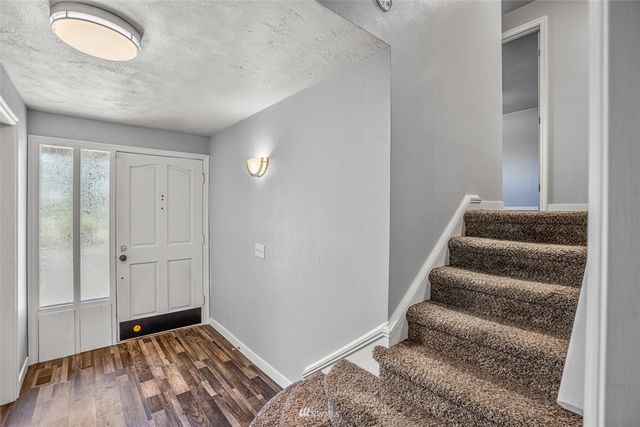 a view of a backyard with wooden floor