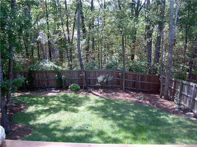 2824 Rader Ridge Court Antioch, TN 37013 - Photo 2 of 12 a view of a backyard with furniture and wooden fence