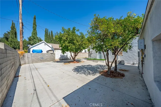 a house with trees in front of it