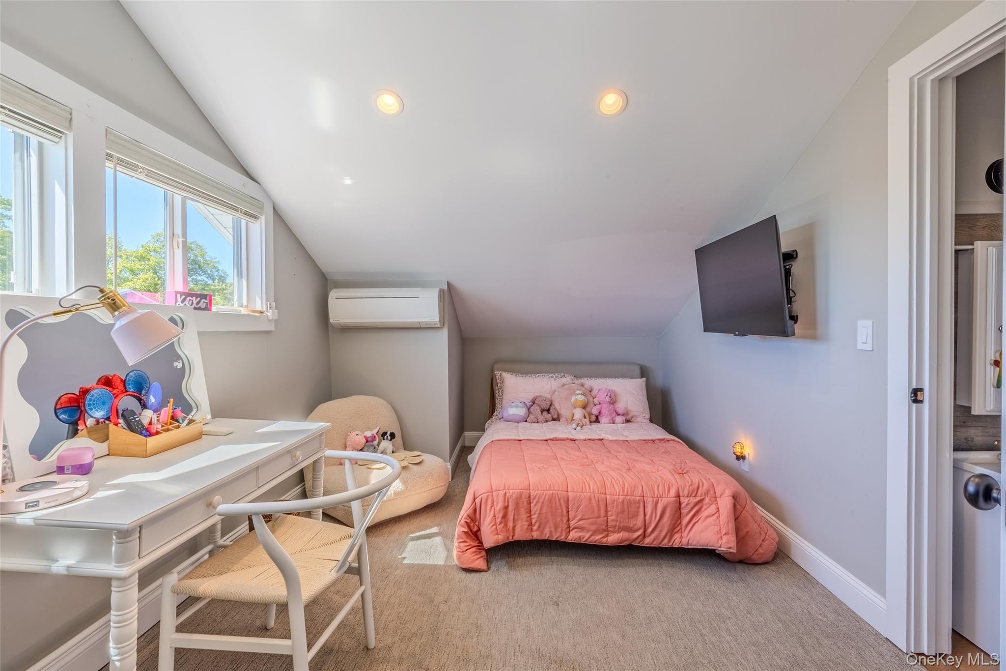 53 Old Neck Road South Center Moriches, NY 11934 - Photo 12 of 50 a bedroom with two beds and a window
