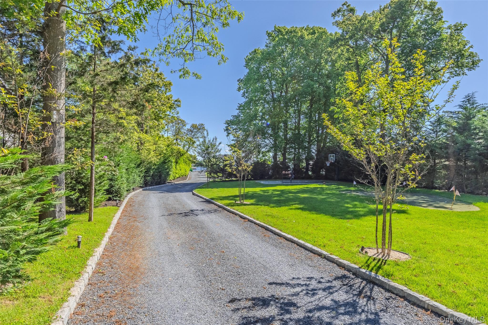 53 Old Neck Road South Center Moriches, NY 11934 - Photo 34 of 50 a view of a park with large trees