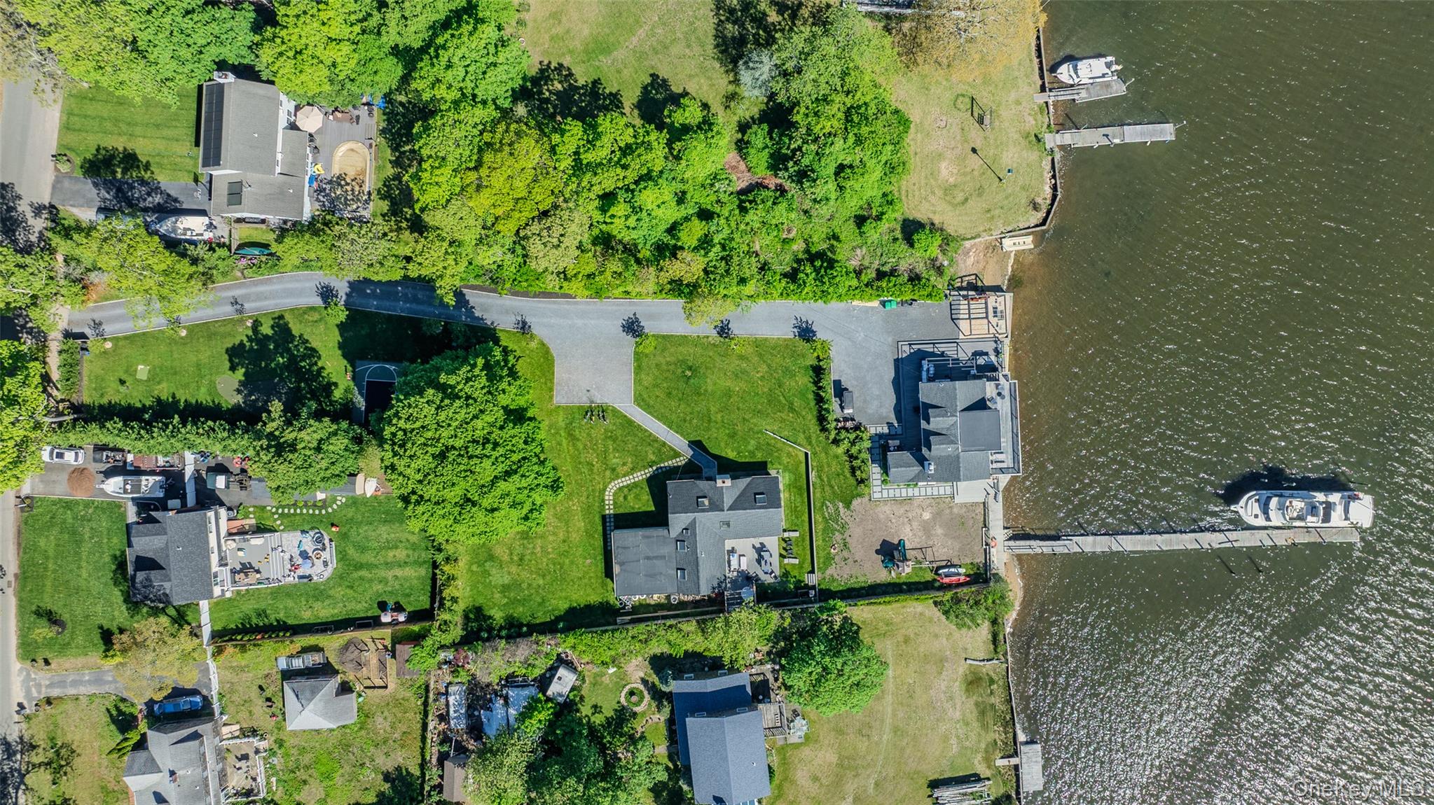 53 Old Neck Road South Center Moriches, NY 11934 - Photo 42 of 50 an aerial view of a house with outdoor space