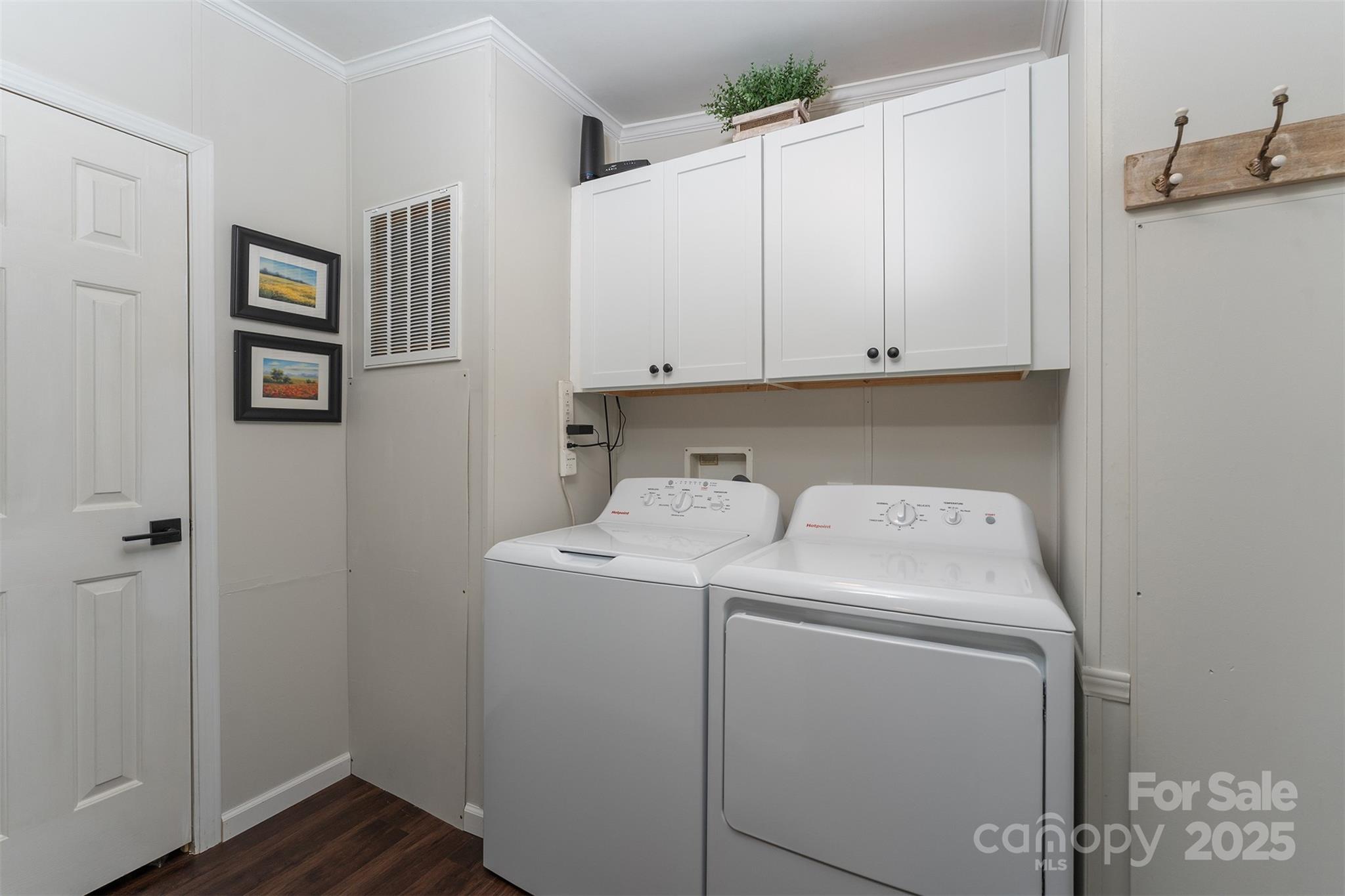 55 Whitaker Circle Fairview, NC 28730 - Photo 21 of 45 a view of storage and utility room with washer and dryer