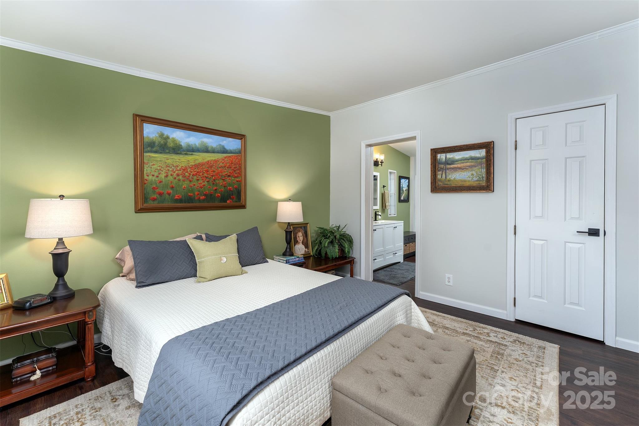 55 Whitaker Circle Fairview, NC 28730 - Photo 23 of 45 a bedroom with a bed and a painting on the wall