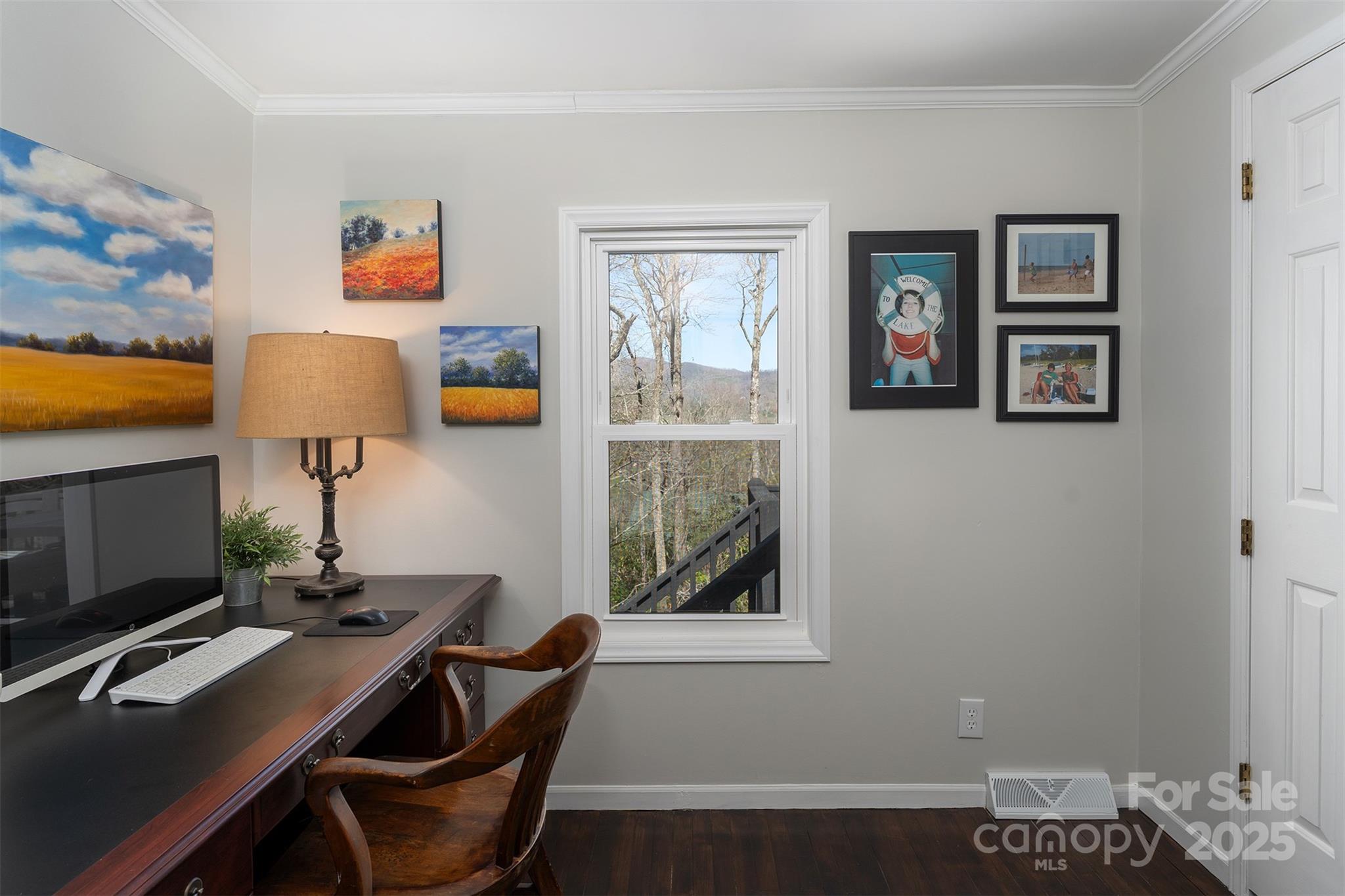 55 Whitaker Circle Fairview, NC 28730 - Photo 26 of 45 a view of a workspace with furniture and a window