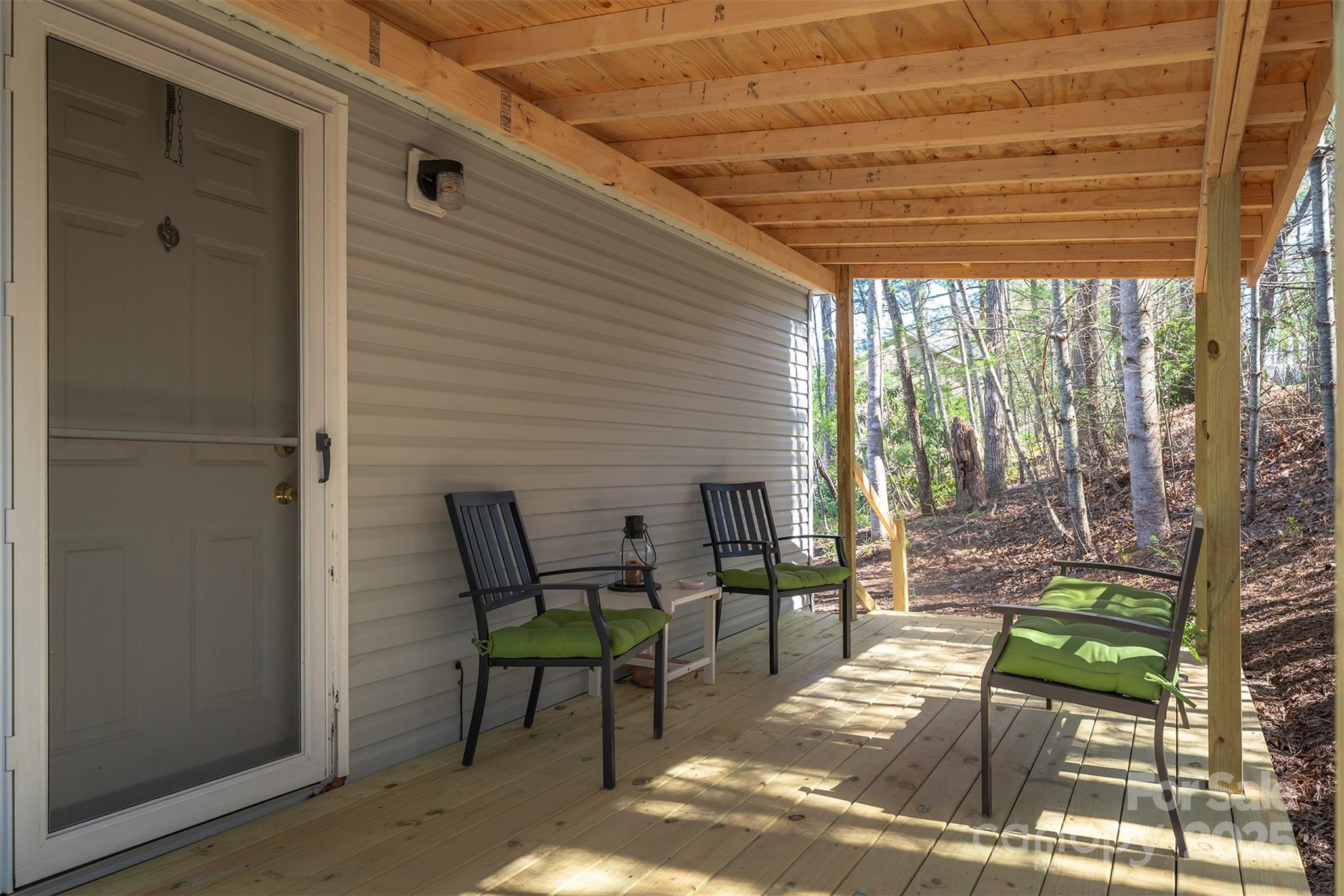 55 Whitaker Circle Fairview, NC 28730 - Photo 29 of 45 a outdoor space with chairs