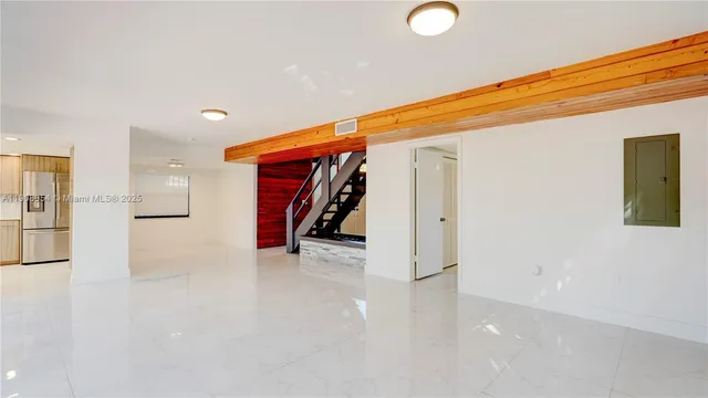 a bathroom with a toilet a sink and a mirror