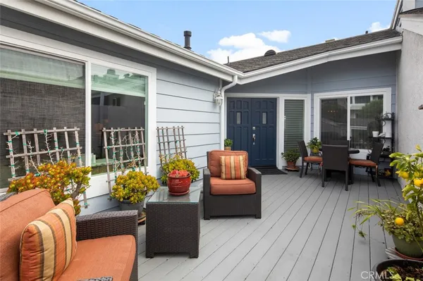 a backyard of a house with seating space