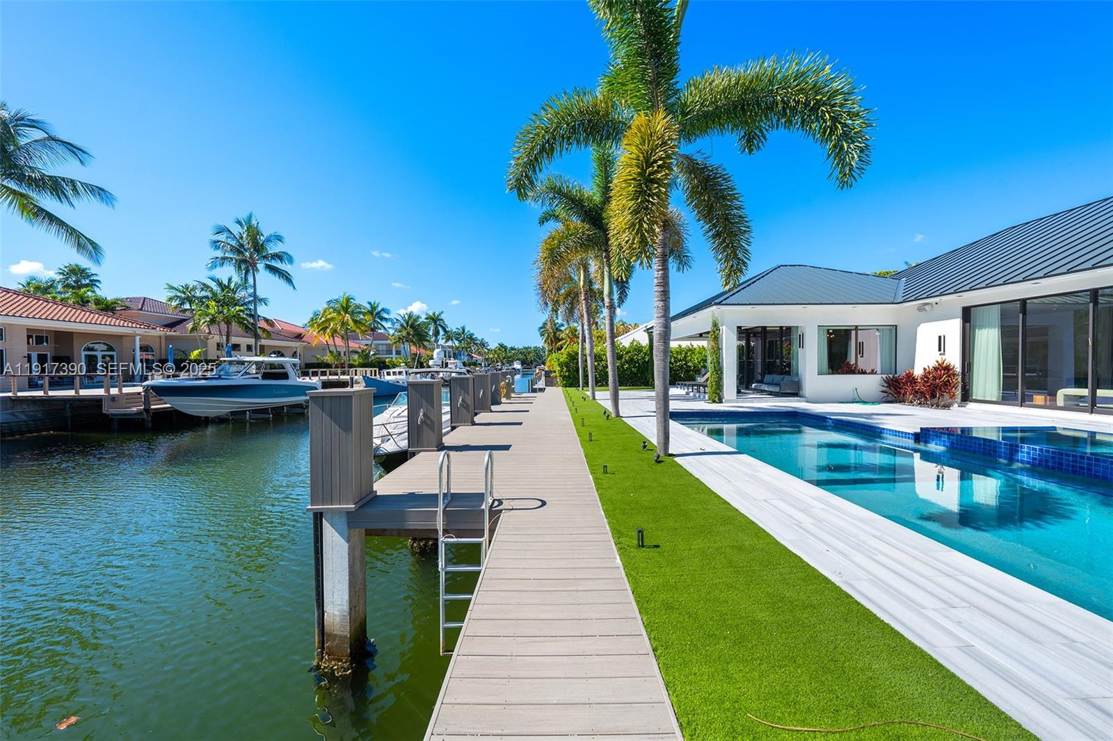 900 Washington Street Hollywood, FL 33019 - Photo 45 of 61 a view of a house with swimming pool