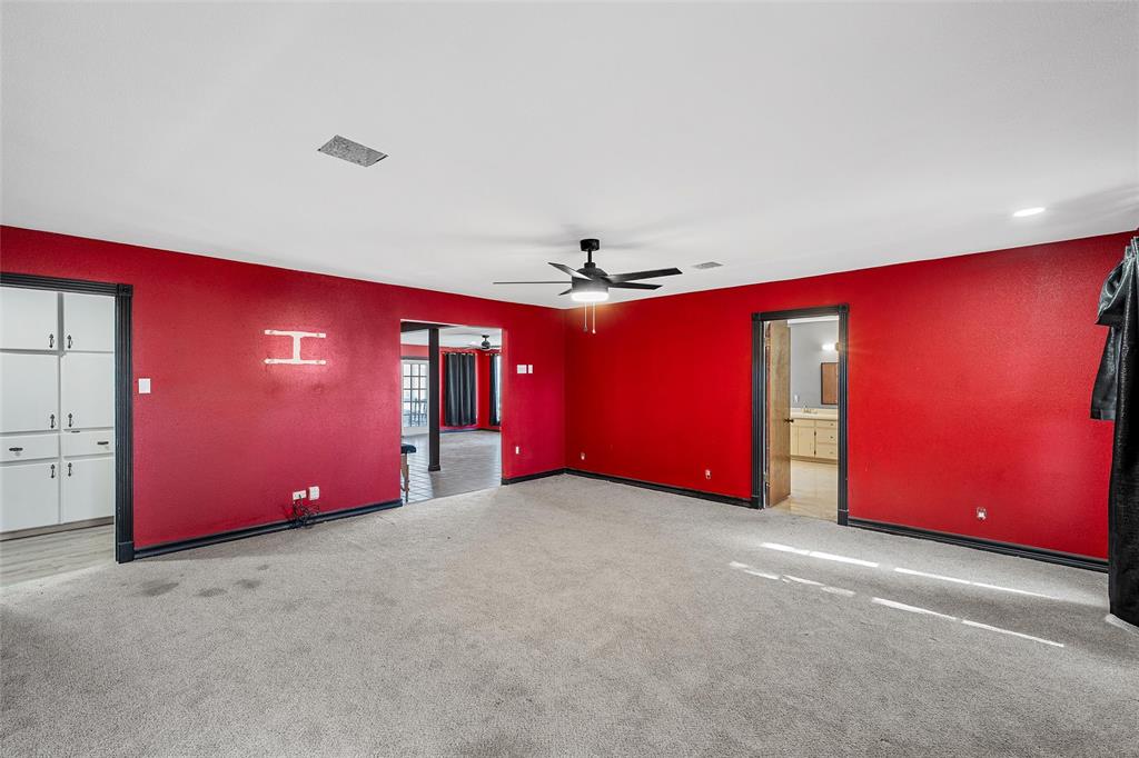 544 Lusk Creek Road Eddy, TX 76524 - Photo 21 of 39 Spare room with light carpet and ceiling fan