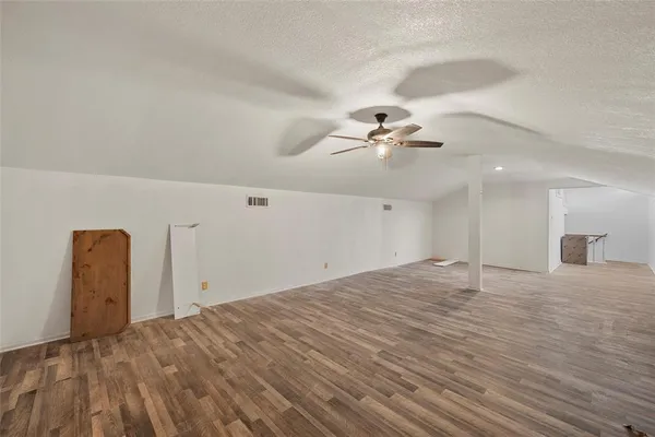 a view of a livingroom with a ceiling fan