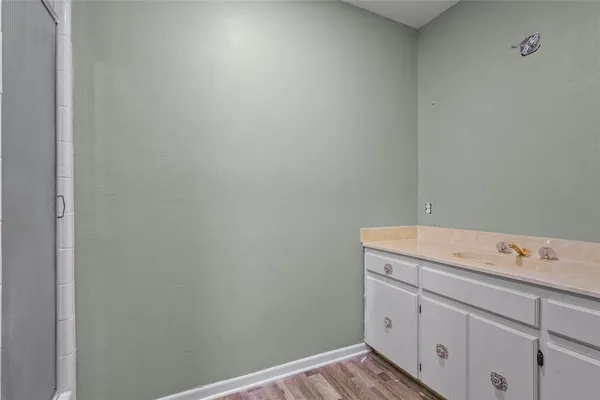 a utility room with cabinets
