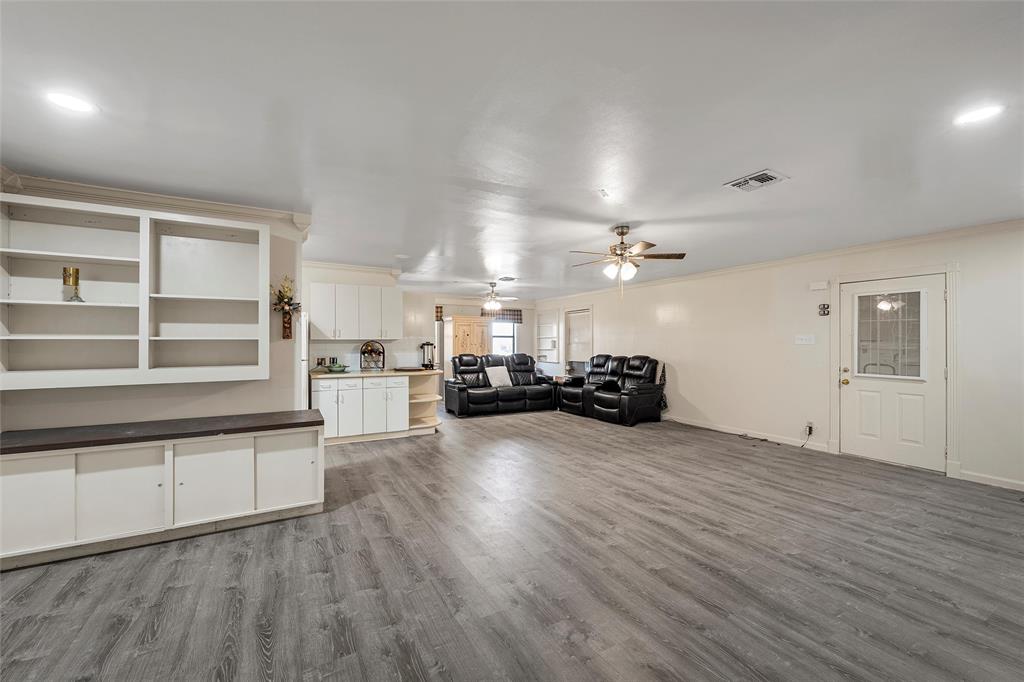 544 Lusk Creek Road Eddy, TX 76524 - Photo 10 of 39 Living room with light wood-style floors, ceiling fan, recessed lighting, and crown molding