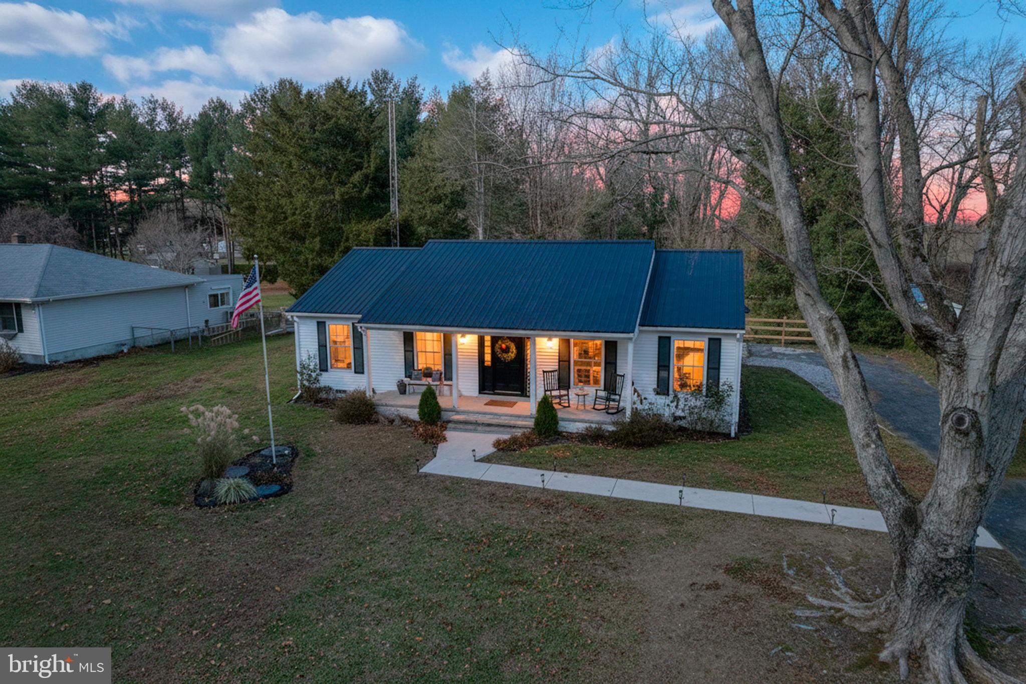 1549 Persimmon Tree Lane Dover, DE 19901 - Photo 2 of 25 a view of a house with backyard and sitting area