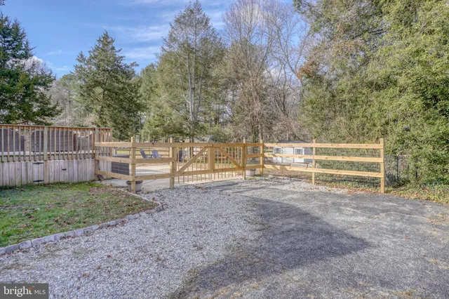 a view of backyard with green space