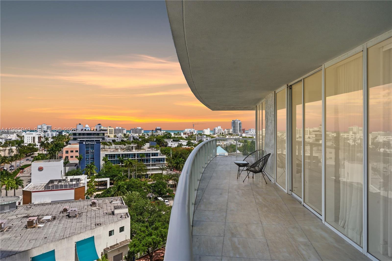 450 Alton Road, Unit 910 Miami Beach, FL 33139 - Photo 36 of 59 a view of a balcony with city view