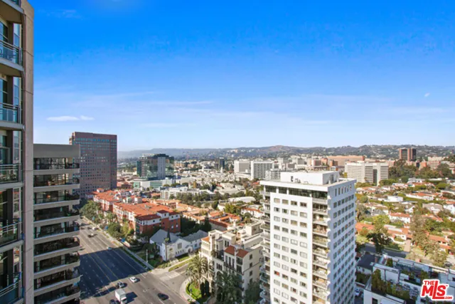 a view of a city with tall buildings