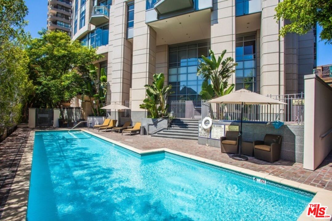 10776 Wilshire Boulevard, Unit 1801 Los Angeles, CA 90024 - Photo 14 of 15 a backyard of a house with seating space