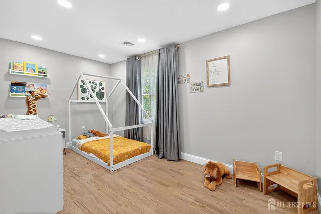 a view of livingroom with furniture and wooden floor