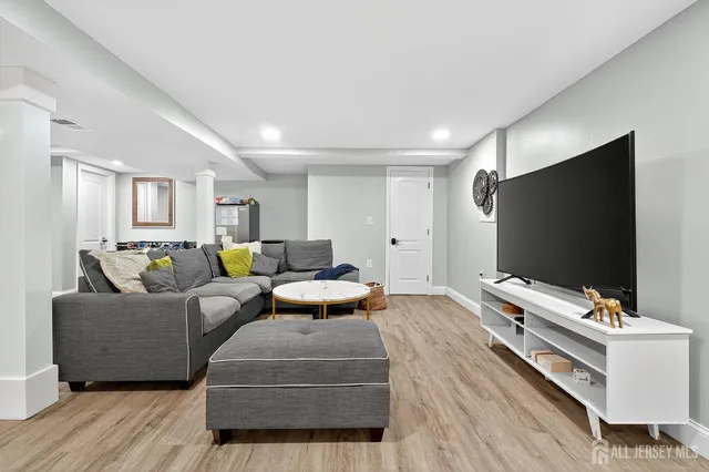 a living room with furniture and a couch