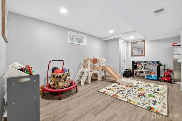 a bathroom with a toilet a sink and a shower